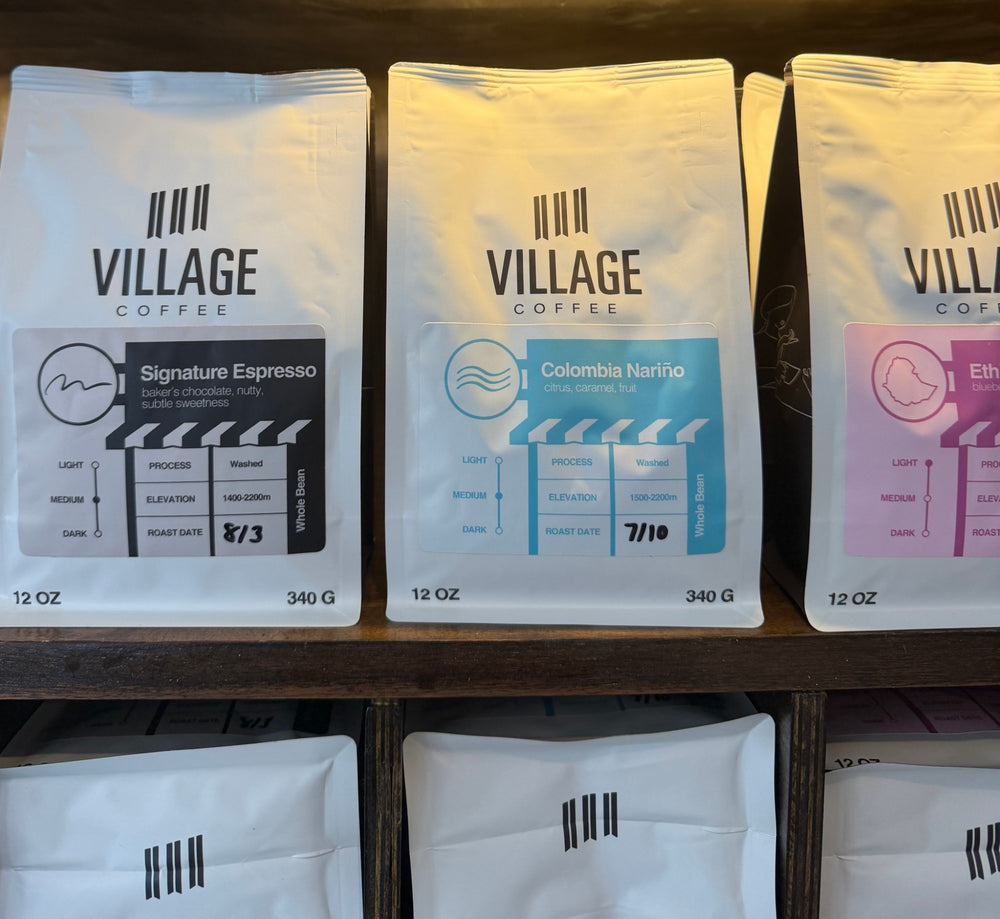 Bags of Village Coffee on the shelf at the Sulphur shop